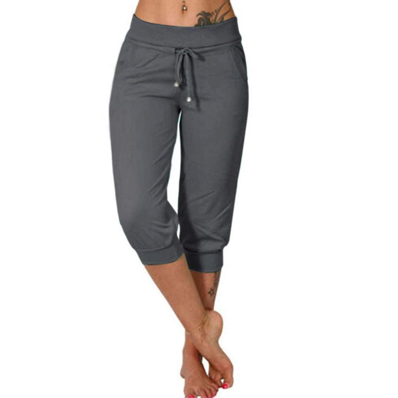 Joggingbyxor med hög midja och smal passform, dragsko och fickor