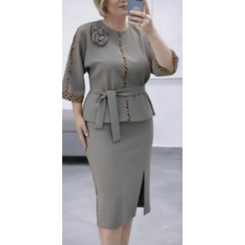 Set med peplum-top med bälte och pennkjol för dam