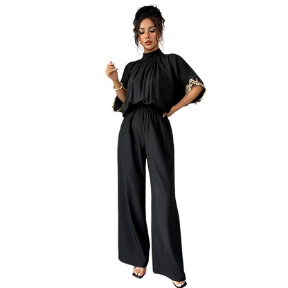 Elegant jumpsuit med hög hals och halvlånga ärmar för damer