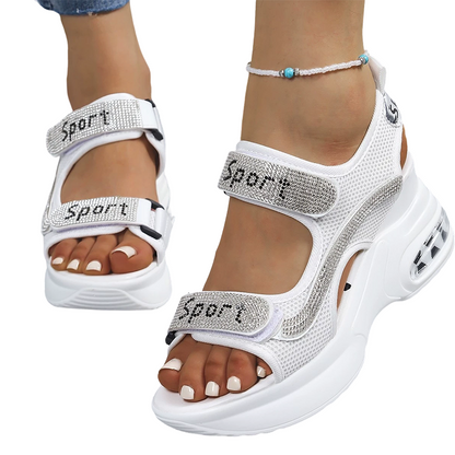 🔥Senaste erbjudande – 50 % rabatt – Trendiga ortopediska sandaler för damer med c-sulaompensée ornées de strass