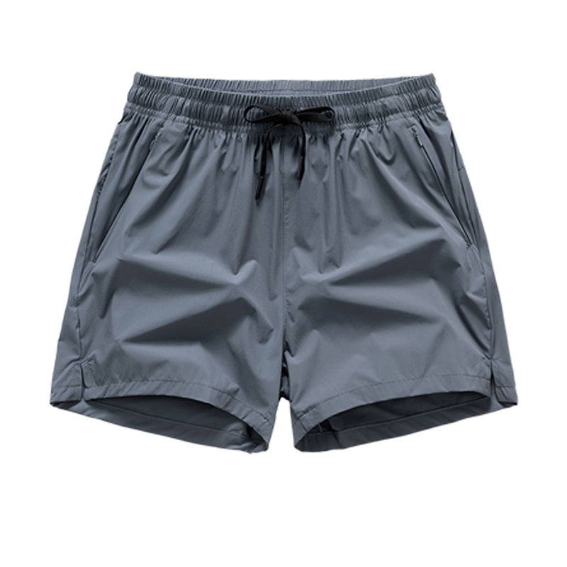 Snabbtorkande sportshorts för män med fickor
