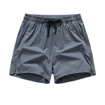 Snabbtorkande sportshorts för män med fickor