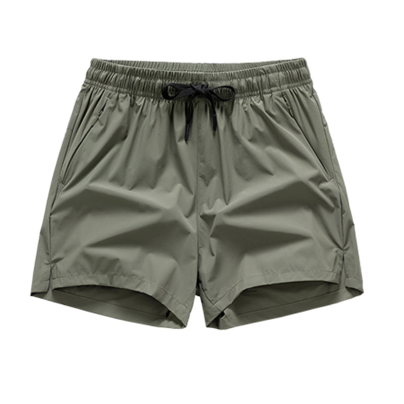 Snabbtorkande sportshorts för män med fickor