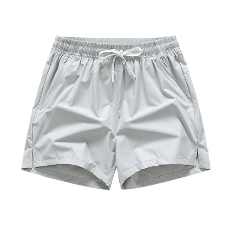 Snabbtorkande sportshorts för män med fickor