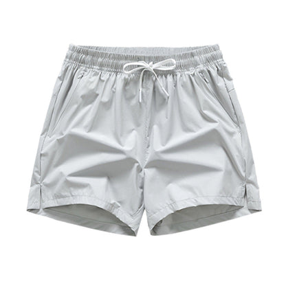Snabbtorkande sportshorts för män med fickor