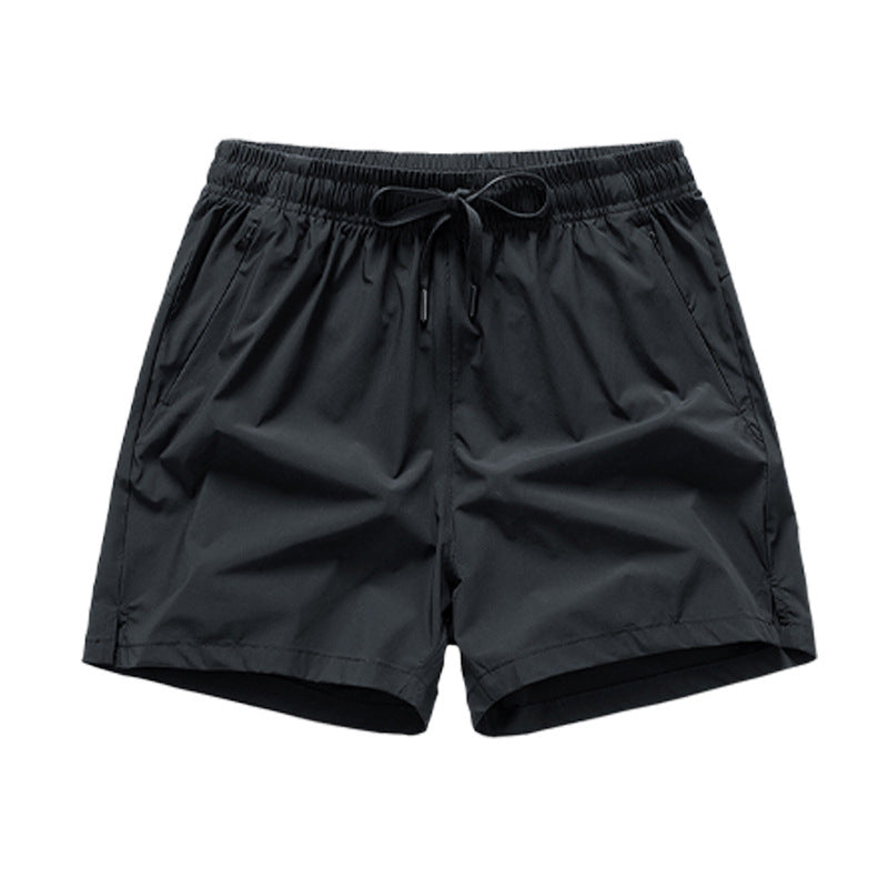 Snabbtorkande sportshorts för män med fickor
