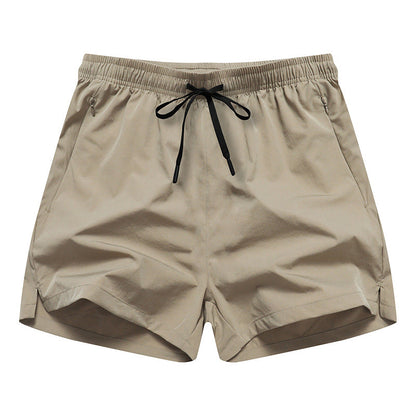 Snabbtorkande sportshorts för män med fickor