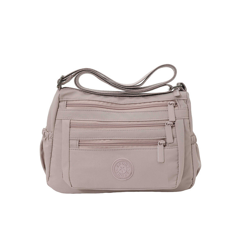 Lätt crossbody-väska i nylon med flera fickor
