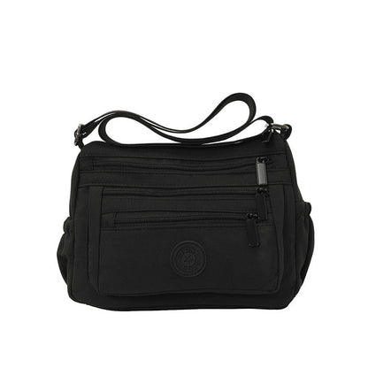 Lätt crossbody-väska i nylon med flera fickor