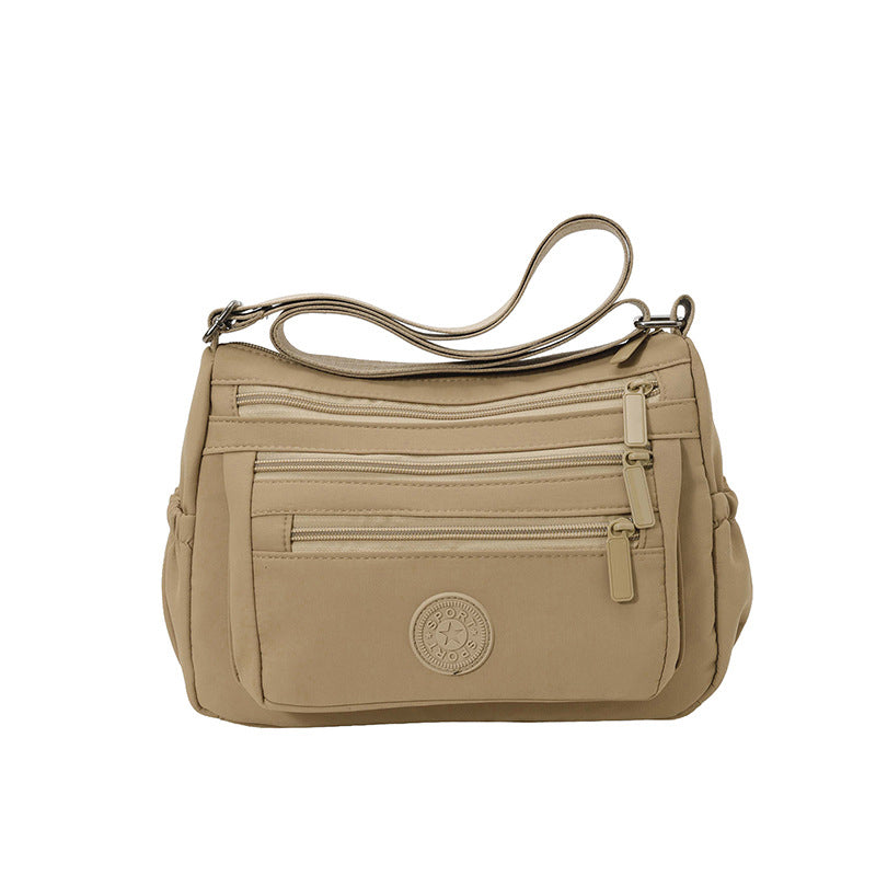 Lätt crossbody-väska i nylon med flera fickor