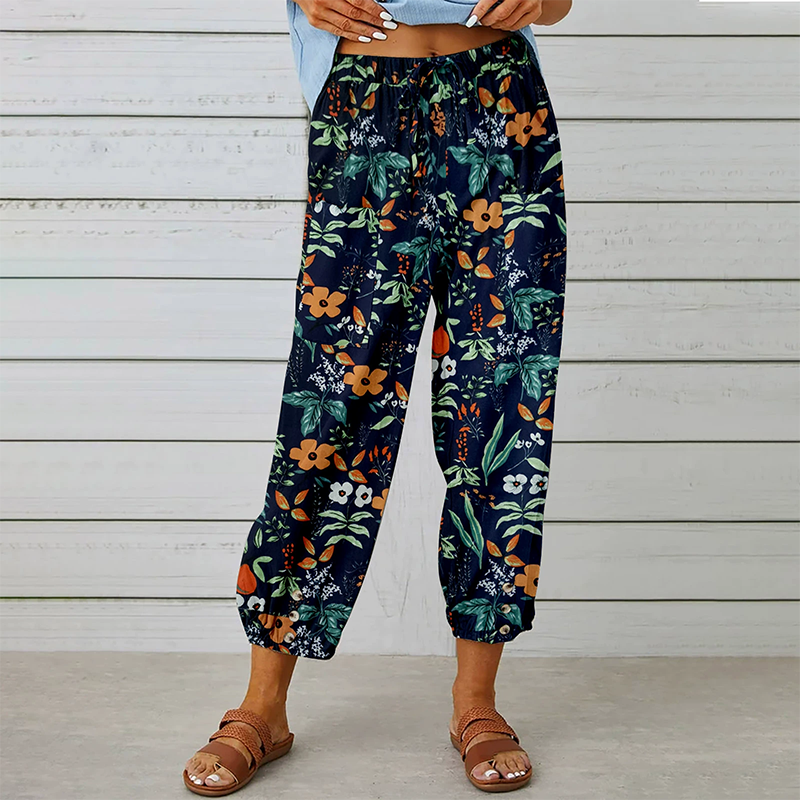 Joggingbyxor i vintage-stil med blommönster och hög midja