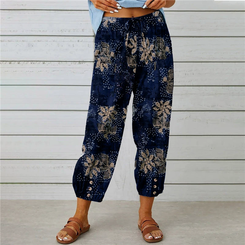 Joggingbyxor i vintage-stil med blommönster och hög midja