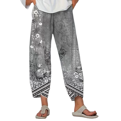 Vintagebyxor med blommönster och vida ben för dam