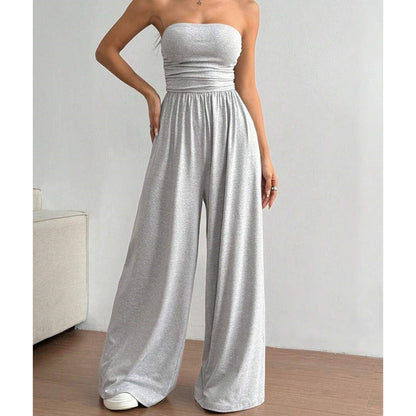 👗🌸 Elegant axelfri jumpsuit med vida ben