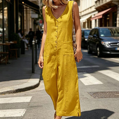 Ärmlös jumpsuit med V-ringning och knappar framtill för dam