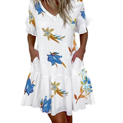 🥳 50 % RABATT! 🥳 – Elegant miniklänning med blommönster och volanger – Perfekt för varma sommardagar!