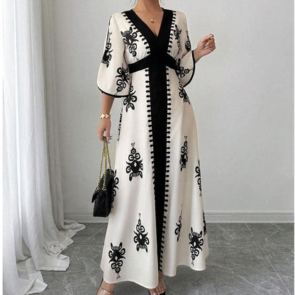 👗Elegant maxiklänning med V-ringning och mönster för damer