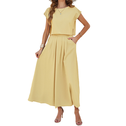 👗🌿 Ärmlöst maxikjolset med veck och fickor