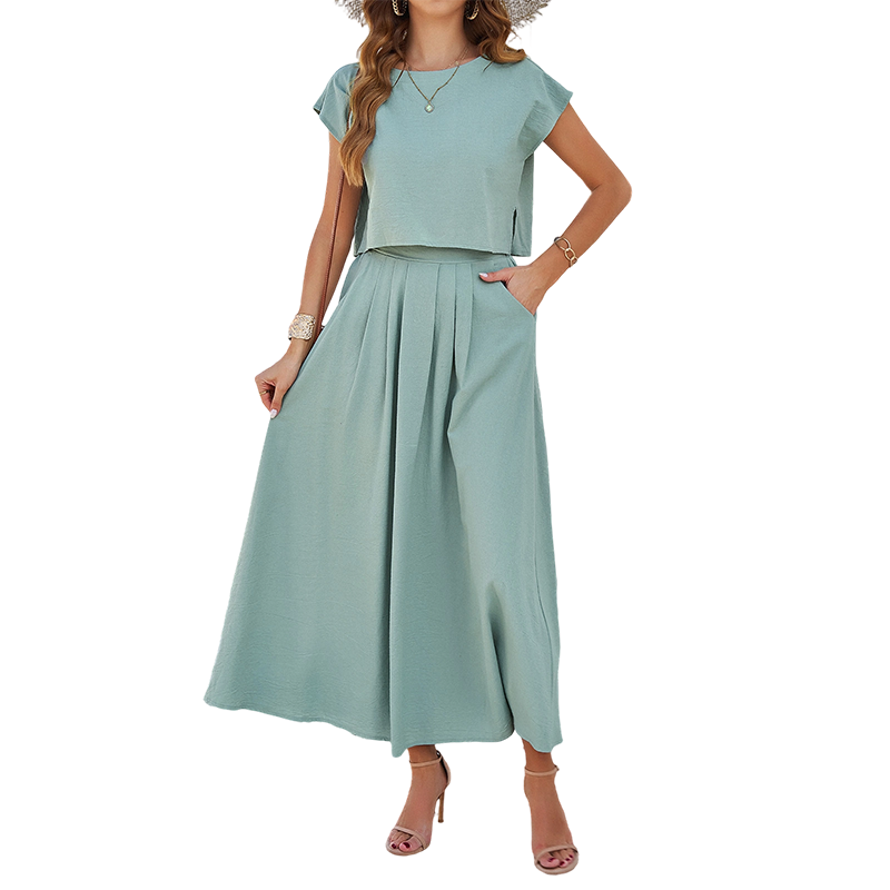 👗🌿 Ärmlöst maxikjolset med veck och fickor