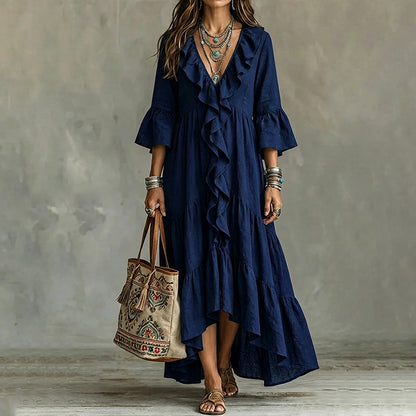Trend just nu⭐👗 V-halsklänning med volanger och klockärmar – tidlös retrostil för moderna kvinnor