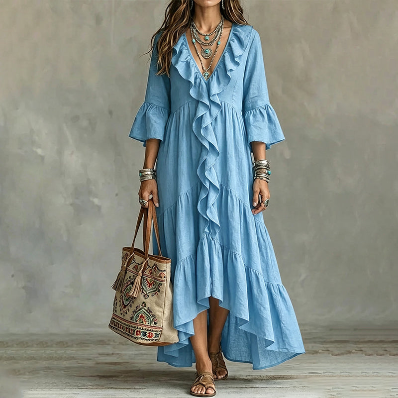 Trend just nu⭐👗 V-halsklänning med volanger och klockärmar – tidlös retrostil för moderna kvinnor