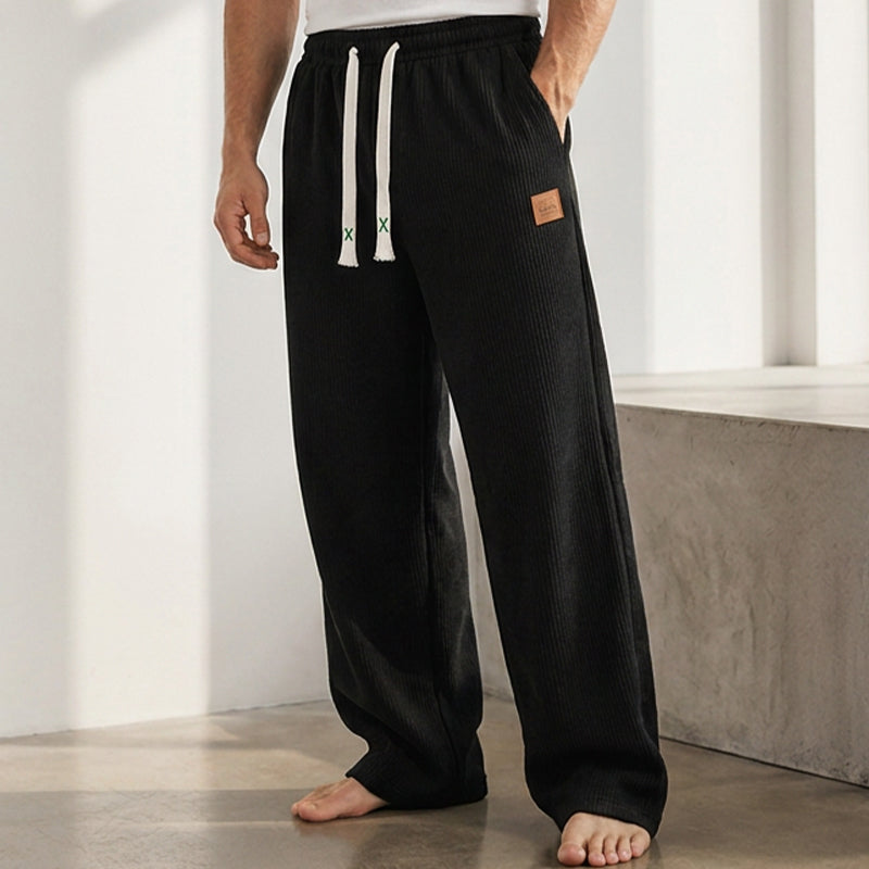 👖💨 Casual-joggingbyxor för män med vida ben – 50 % rabatt! Mjukt tyg, avslappnad passform, justerbar midja – bekväm streetwear för vardagen.💪