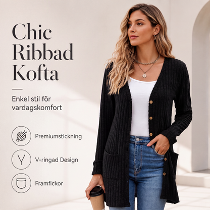 Midjelång stickad kofta med fickor