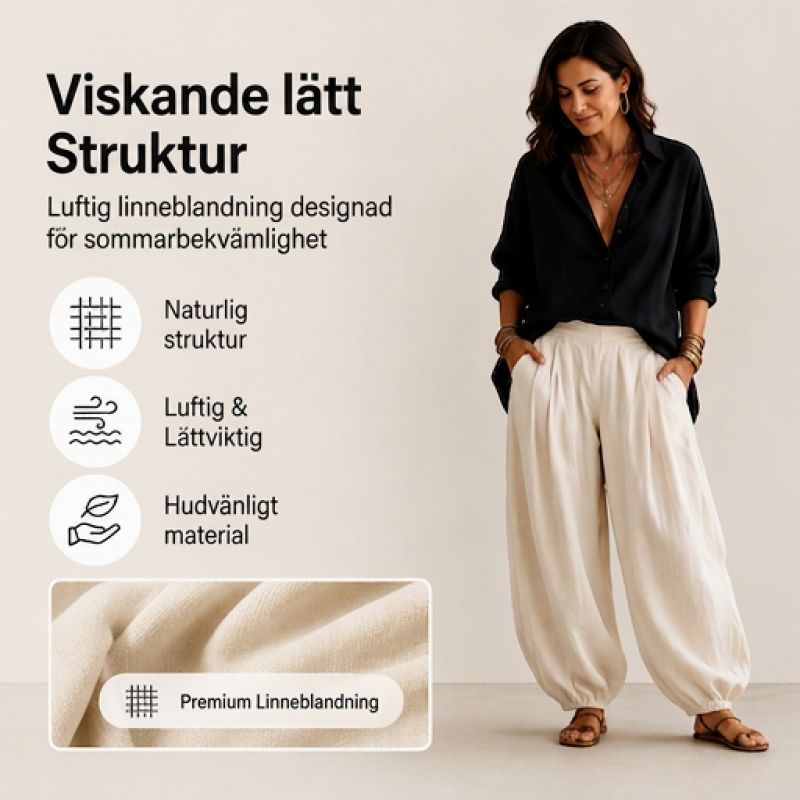 Damset med lös skjorta och draperade byxor