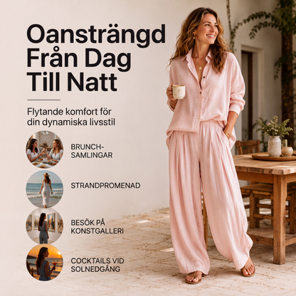 Damset med lös skjorta och draperade byxor