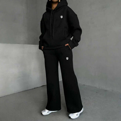 Set med hoodie och byxor med vida ben för damer