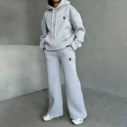 Set med hoodie och byxor med vida ben för damer