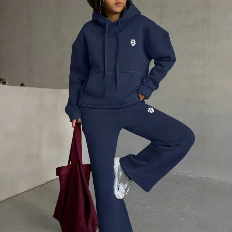 Set med hoodie och byxor med vida ben för damer