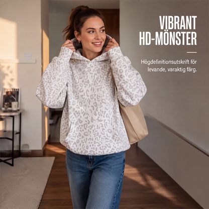 Damleopardmönstrad huvtröja