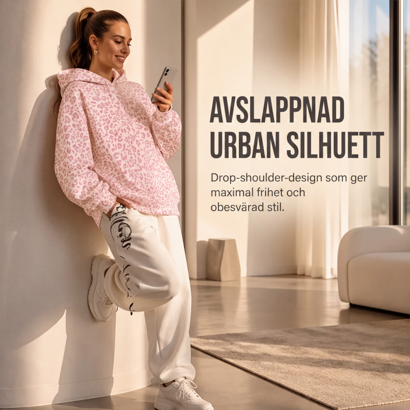 Damleopardmönstrad huvtröja