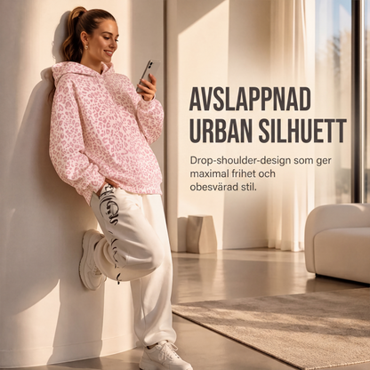 Damleopardmönstrad huvtröja