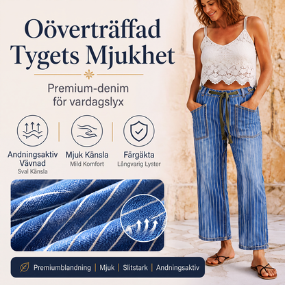 Damjeans i vertikalrandigt stretchigt tyg
