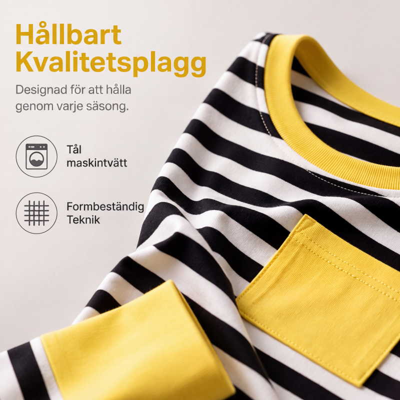 Tvådelat set för kvinnor med randig långärmad topp och byxor