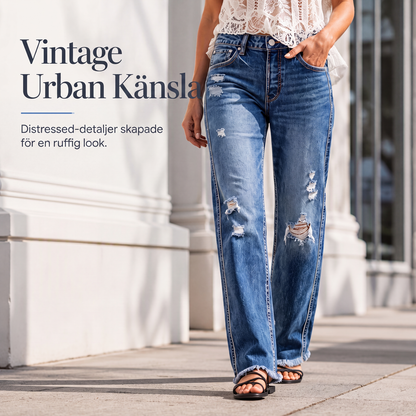 Dam jeans med sliten look, rak modell