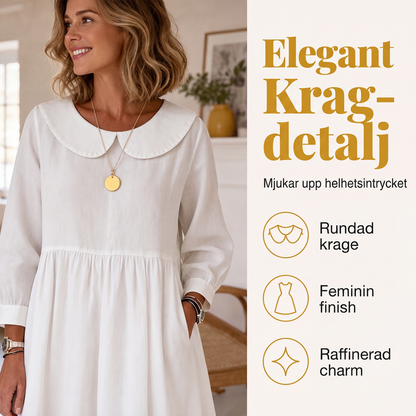 Damig löst sittande långärmad maxiklänning med fickor