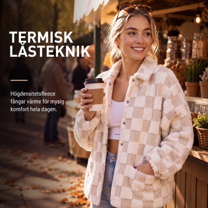 Dammig plyschjacka med rutmönster och tryckknappar