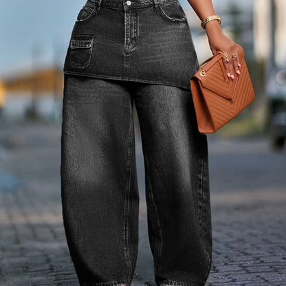 Kjol lager ovanpå denimjeans för kvinnor