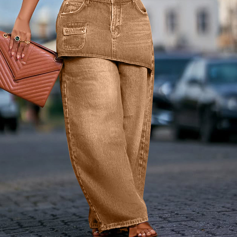 Kjol lager ovanpå denimjeans för kvinnor