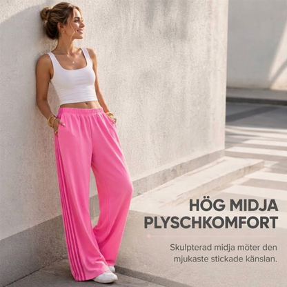 Damens vidbenta joggingbyxor med sidoränder