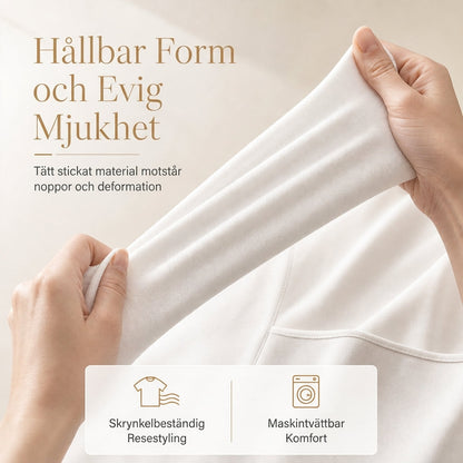 Damklänning med långa ärmar, fyrkantig halsringning och A-linje