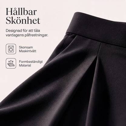 Damernas lediga högmidjade vida byxor