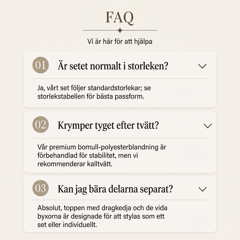Damset med kort dragkedja-tröja och vida byxor