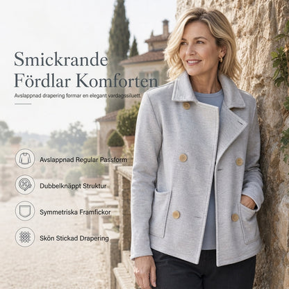 Klassiskt enfärgat ytterplagg